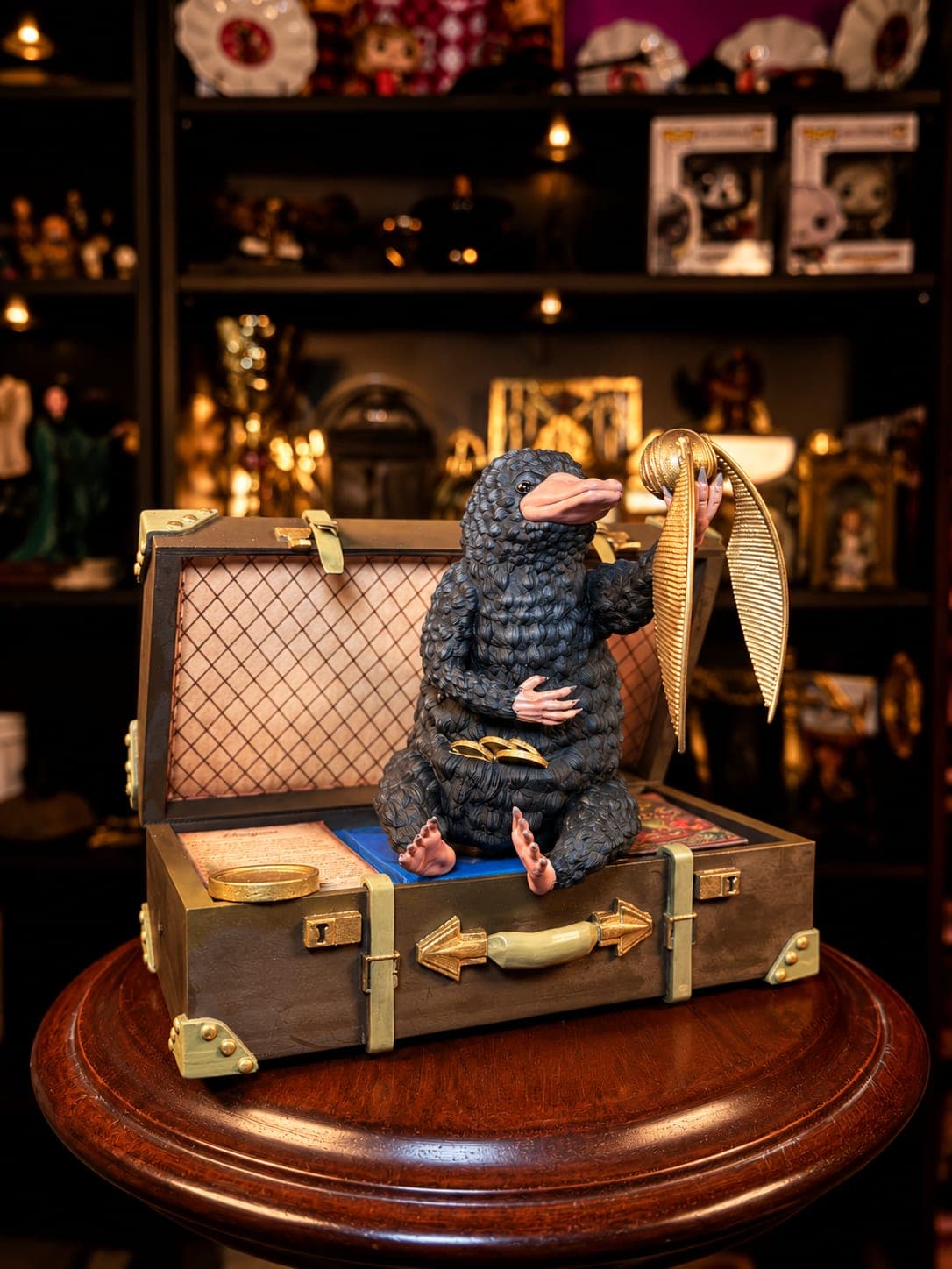 escarbato niffler criatura buscadora de tesoros figura coleccionable mundo magico